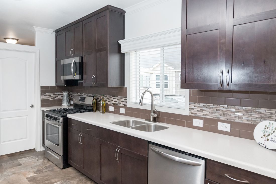 The K3060A Kitchen. This Manufactured Mobile Home features 3 bedrooms and 2 baths.