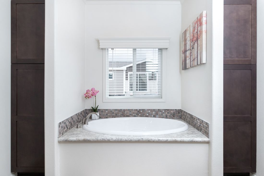 The K3060A Primary Bathroom. This Manufactured Mobile Home features 3 bedrooms and 2 baths.