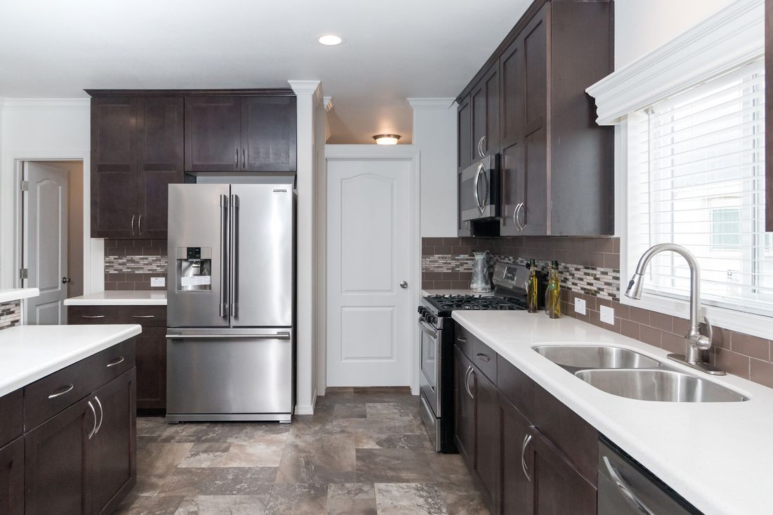 The K3060A Kitchen. This Manufactured Mobile Home features 3 bedrooms and 2 baths.