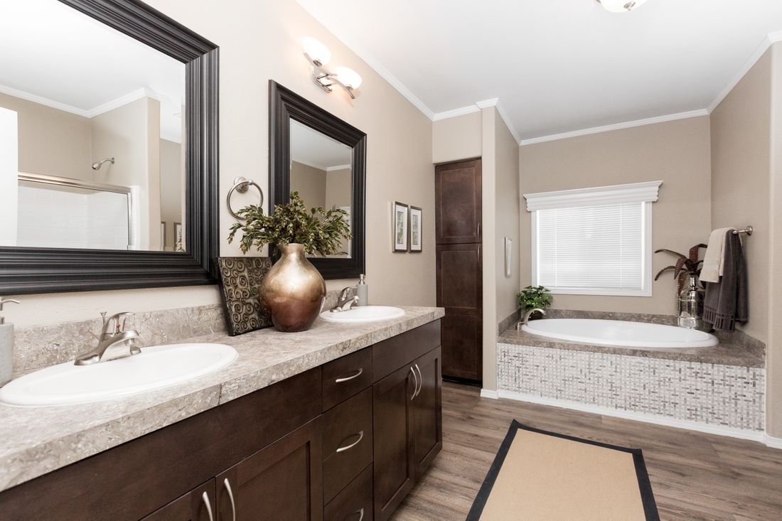 The K3060A Primary Bathroom. This Manufactured Mobile Home features 3 bedrooms and 2 baths.