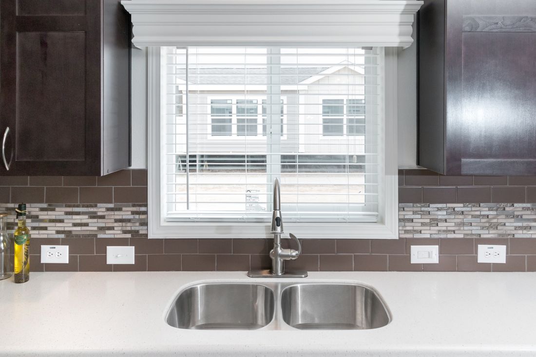 The K3060A Kitchen. This Manufactured Mobile Home features 3 bedrooms and 2 baths.
