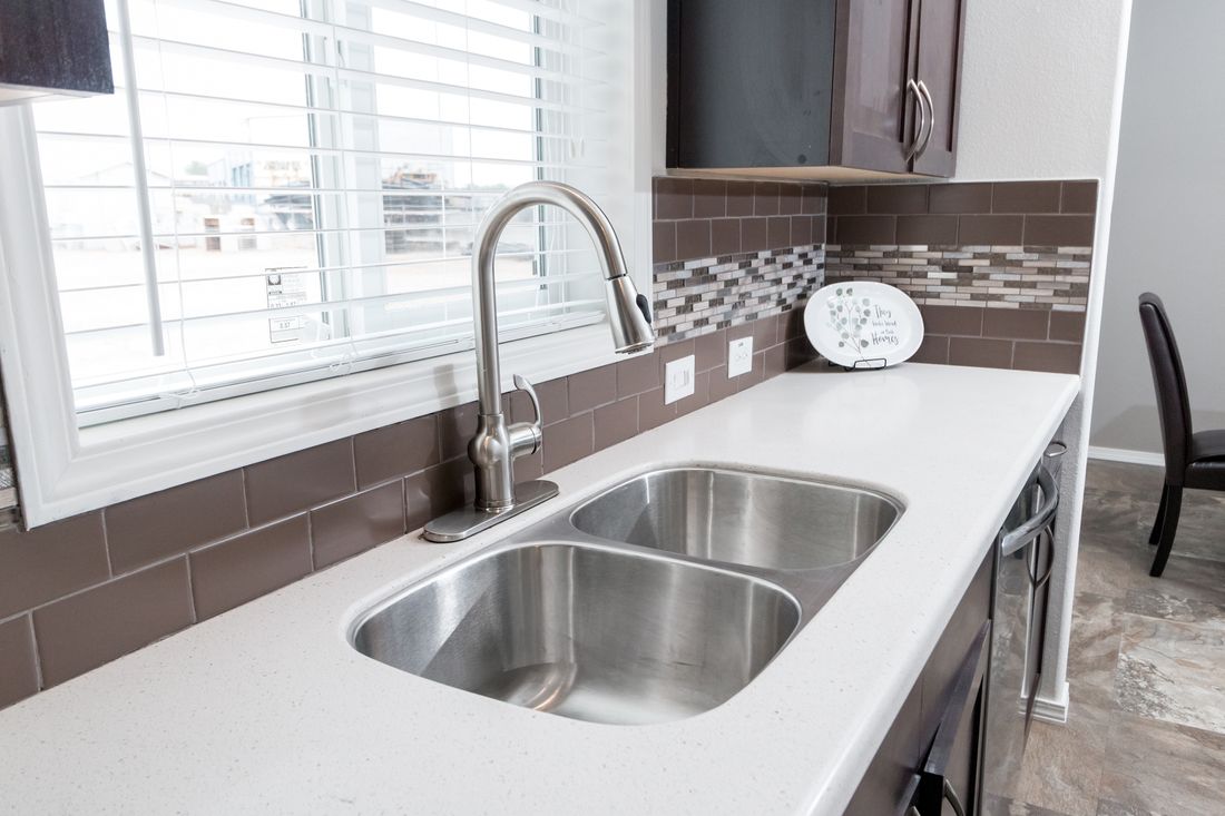 The K3060A Kitchen. This Manufactured Mobile Home features 3 bedrooms and 2 baths.