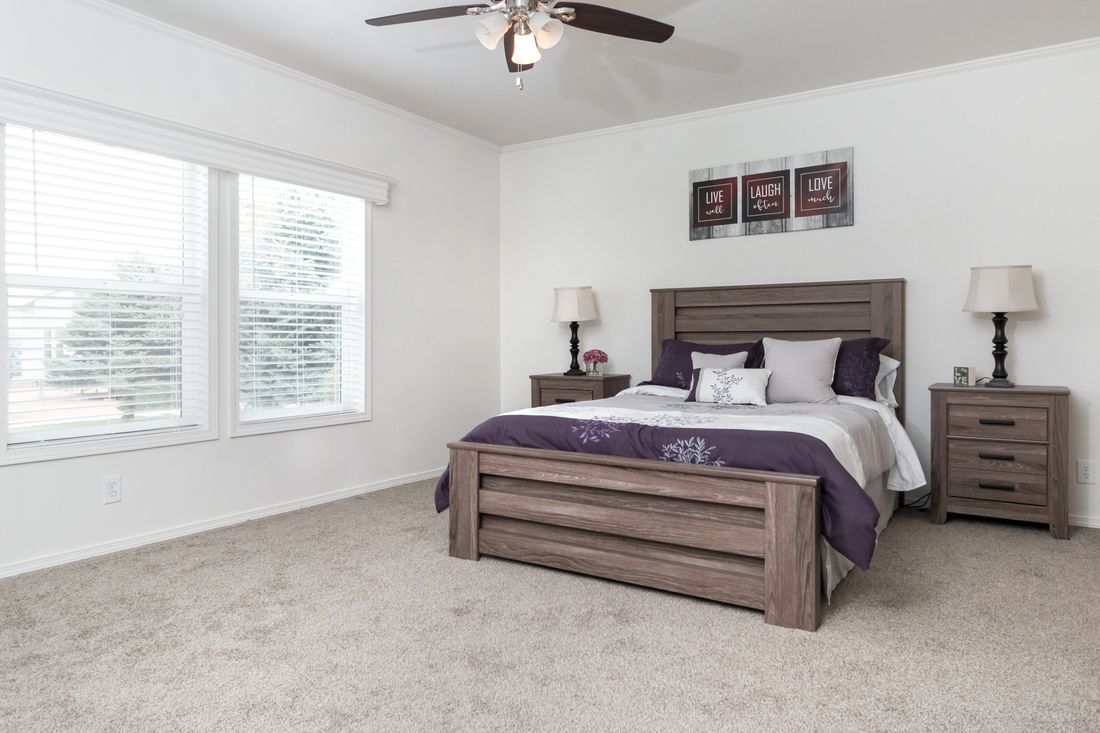 The K3060A Primary Bedroom. This Manufactured Mobile Home features 3 bedrooms and 2 baths.