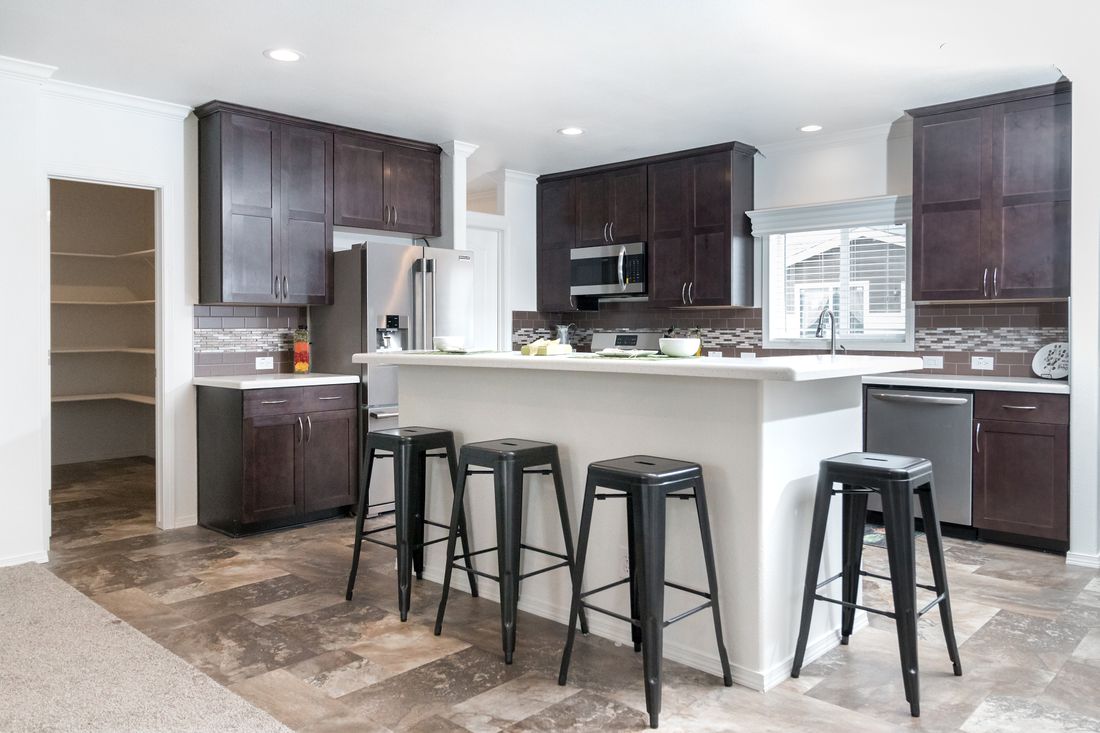 The K3060A Kitchen. This Manufactured Mobile Home features 3 bedrooms and 2 baths.