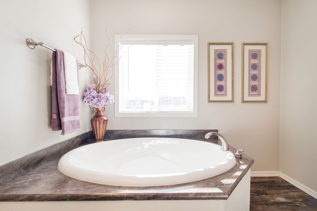 The K2760B Primary Bathroom. This Manufactured Mobile Home features 4 bedrooms and 2 baths.