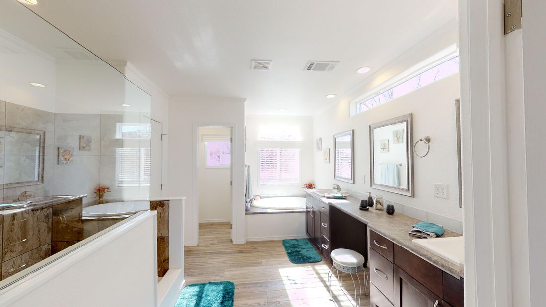 The SUM3068A Primary Bathroom. This Manufactured Mobile Home features 3 bedrooms and 2 baths.