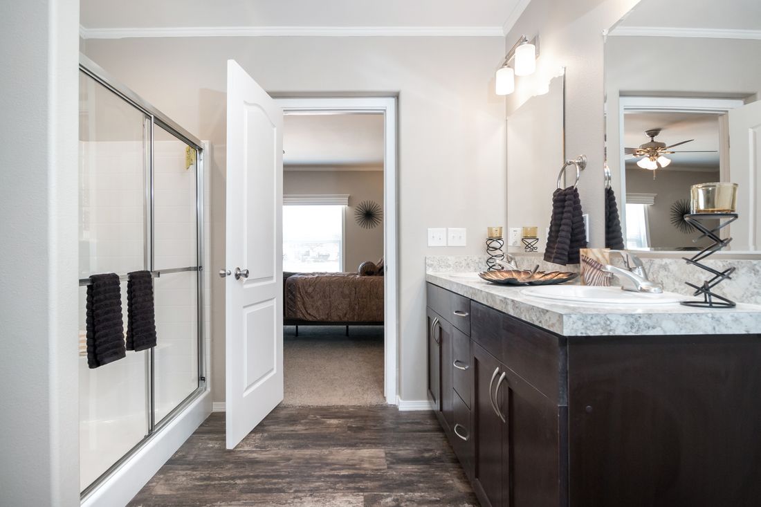 The K3076B Primary Bathroom. This Manufactured Mobile Home features 4 bedrooms and 2 baths.