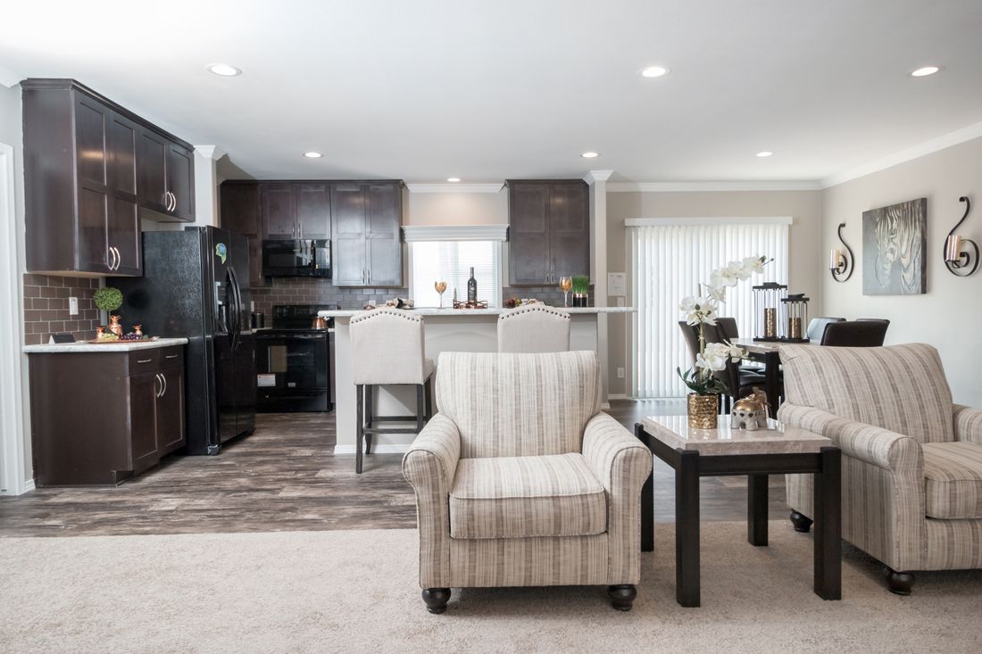 The K3076B Living Room. This Manufactured Mobile Home features 4 bedrooms and 2 baths.
