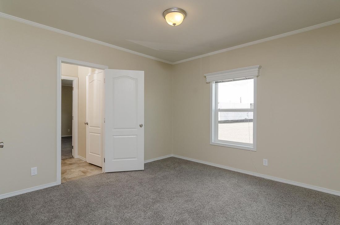 The K3076A Bedroom. This Manufactured Mobile Home features 4 bedrooms and 2 baths.