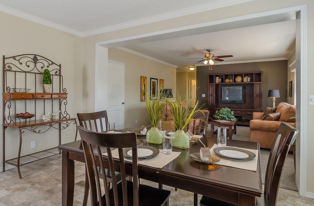 The K3076A Dining Area. This Manufactured Mobile Home features 4 bedrooms and 2 baths.