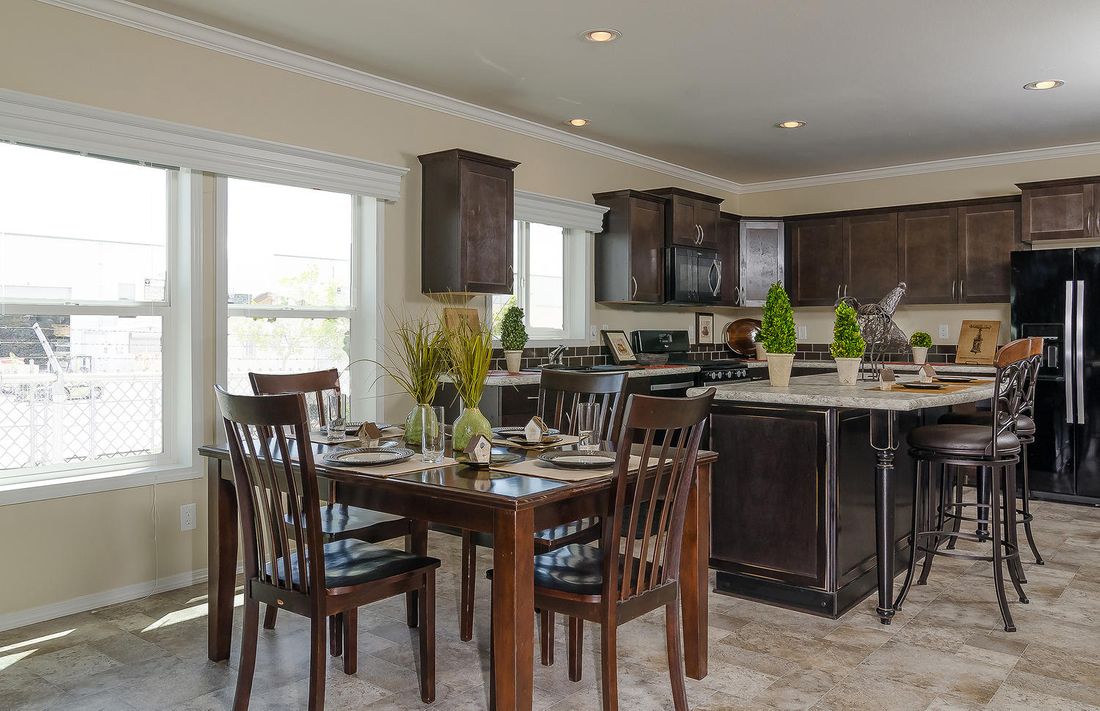 The K3076A Dining Area. This Manufactured Mobile Home features 4 bedrooms and 2 baths.