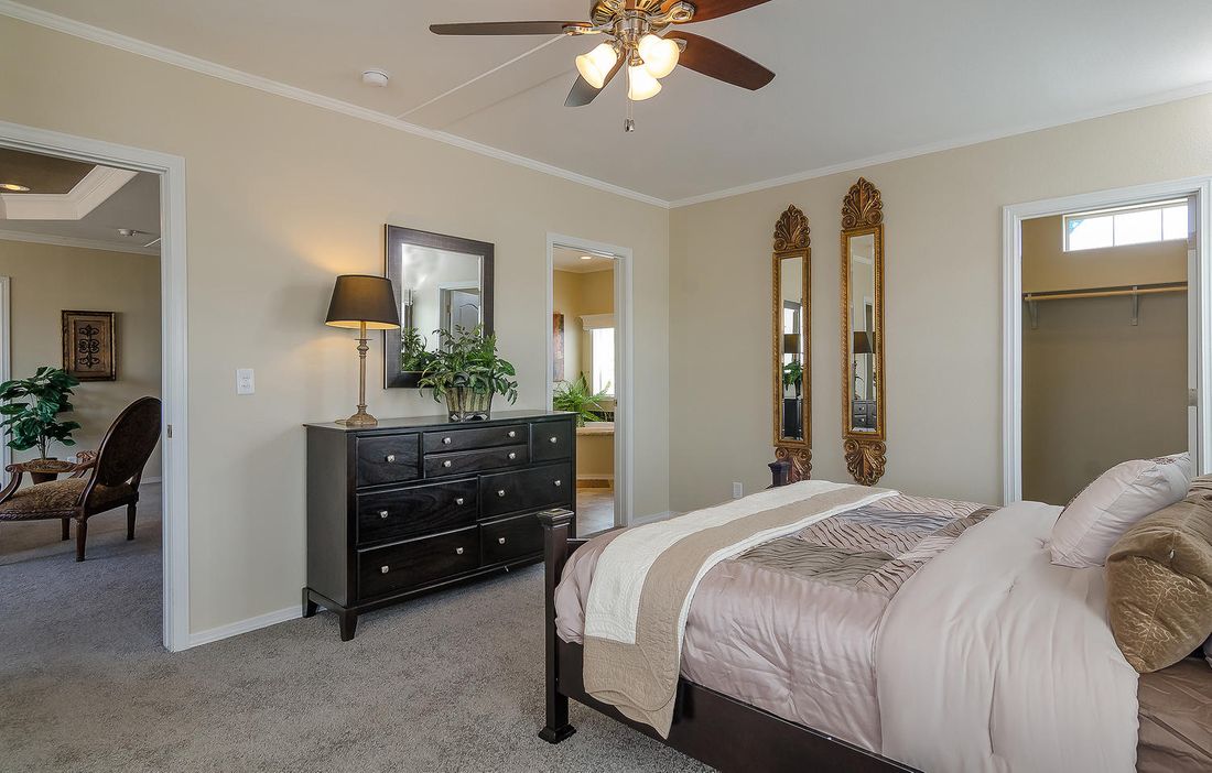 The K3076A Primary Bedroom. This Manufactured Mobile Home features 4 bedrooms and 2 baths.