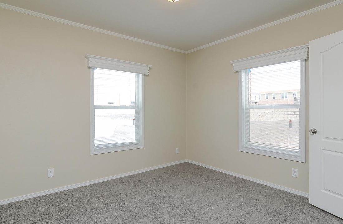 The K3076A Bedroom. This Manufactured Mobile Home features 4 bedrooms and 2 baths.