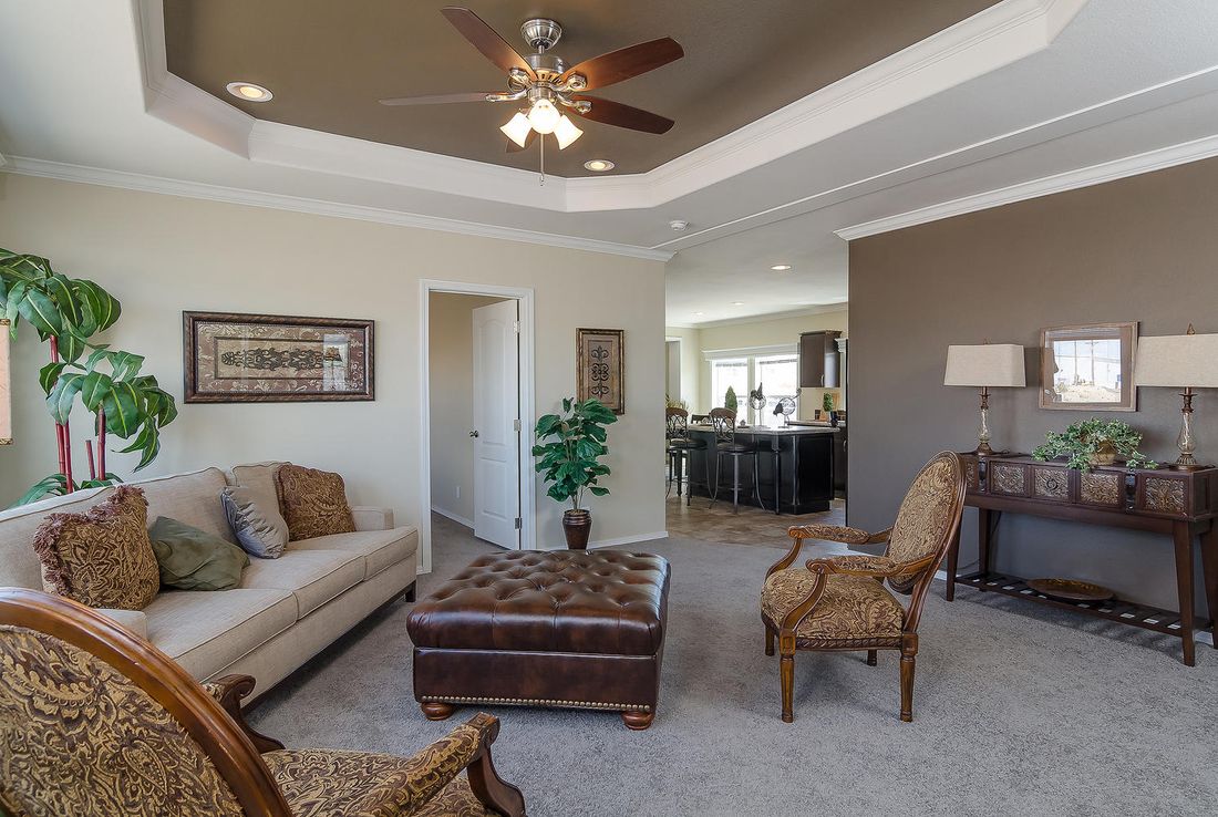 The K3076A Living Room. This Manufactured Mobile Home features 4 bedrooms and 2 baths.