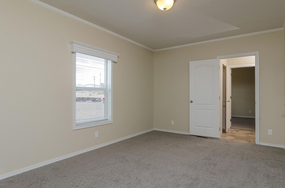 The K3076A Bedroom. This Manufactured Mobile Home features 4 bedrooms and 2 baths.