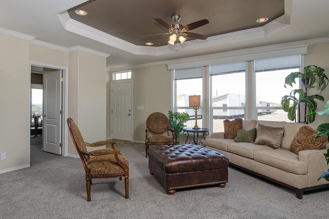The K3076A Living Room. This Manufactured Mobile Home features 4 bedrooms and 2 baths.