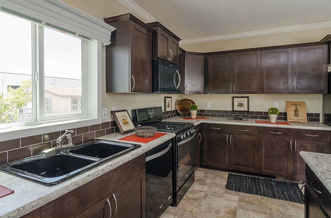The K3076A Kitchen. This Manufactured Mobile Home features 4 bedrooms and 2 baths.