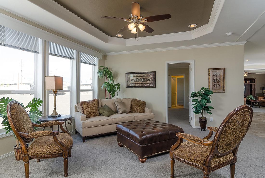 The K3076A Living Room. This Manufactured Mobile Home features 4 bedrooms and 2 baths.