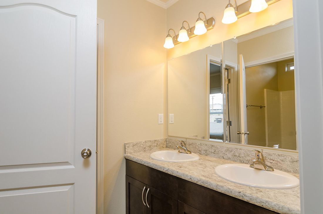 The K3076A Primary Bathroom. This Manufactured Mobile Home features 4 bedrooms and 2 baths.