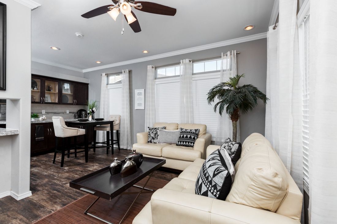 The K1640A Living Room. This Manufactured Mobile Home features 1 bedroom and 1 bath.