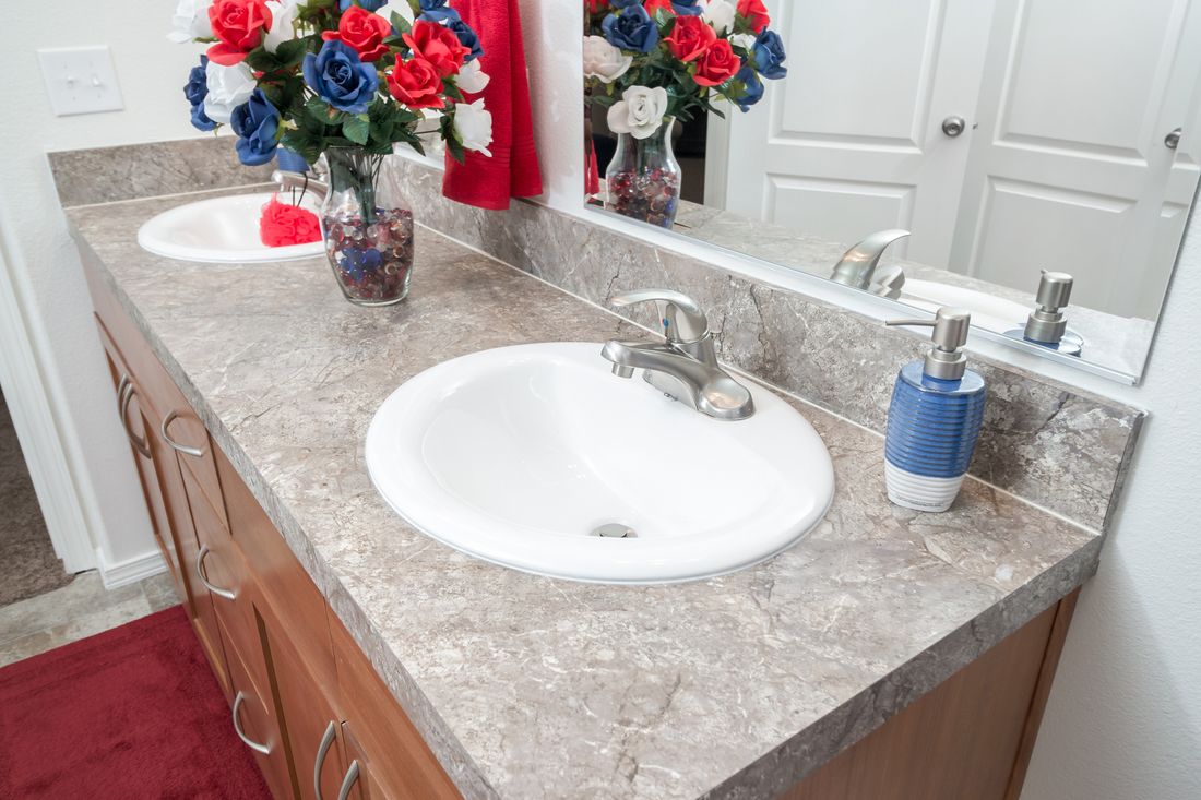 The K2760A Primary Bathroom. This Manufactured Mobile Home features 3 bedrooms and 2 baths.
