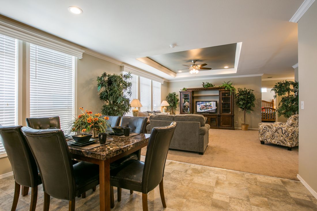 The TRANQUILITY TR3062A Dining Area. This Manufactured Mobile Home features 3 bedrooms and 2 baths.