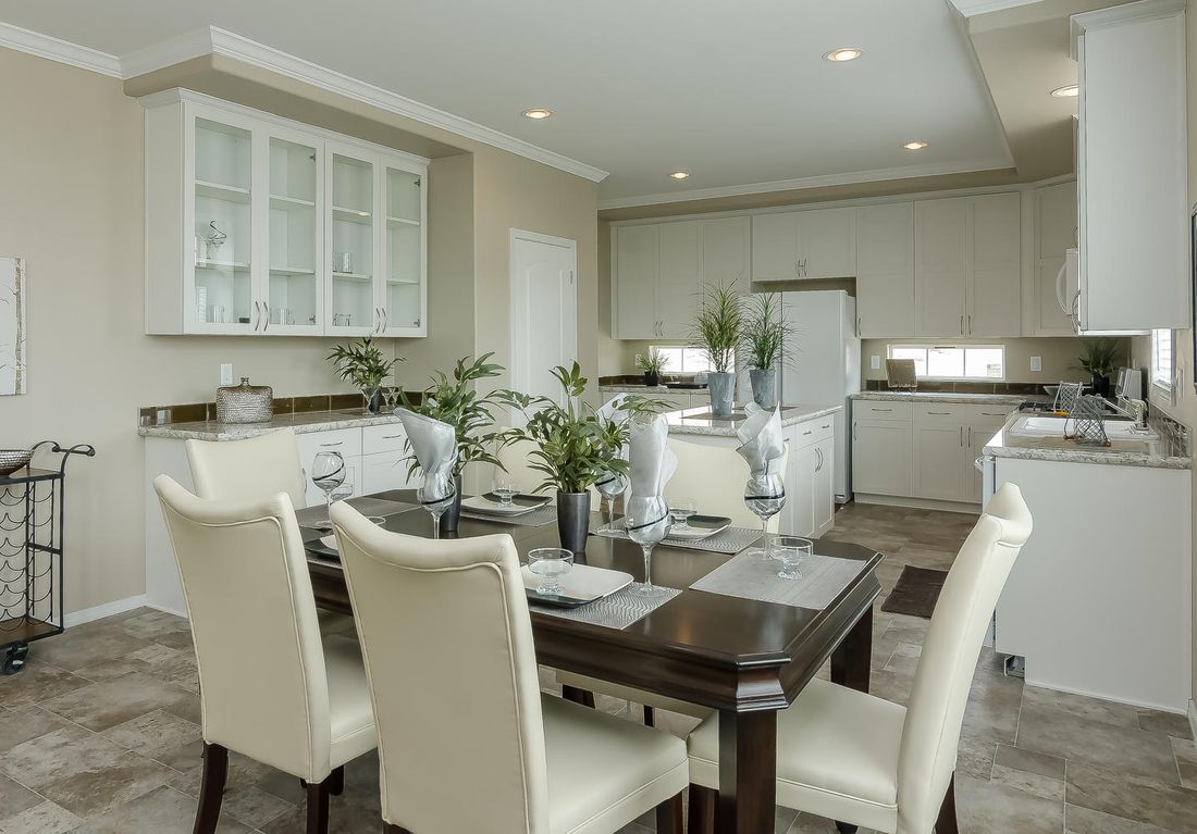 The TRANQUILITY TR3062A Dining Area. This Manufactured Mobile Home features 3 bedrooms and 2 baths.