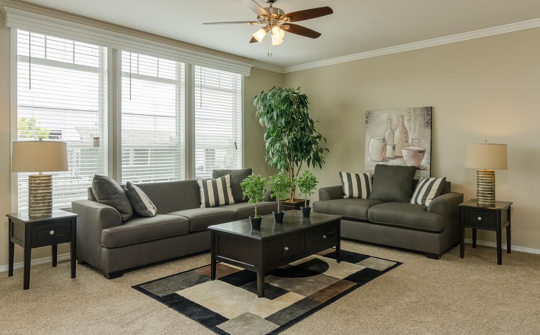 The TRANQUILITY TR3062A Living Room. This Manufactured Mobile Home features 3 bedrooms and 2 baths.