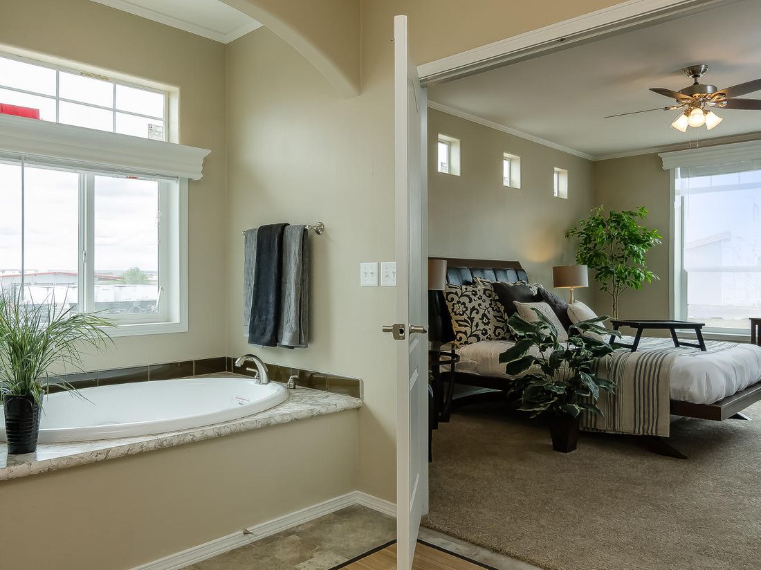 The TRANQUILITY TR3062A Primary Bathroom. This Manufactured Mobile Home features 3 bedrooms and 2 baths.