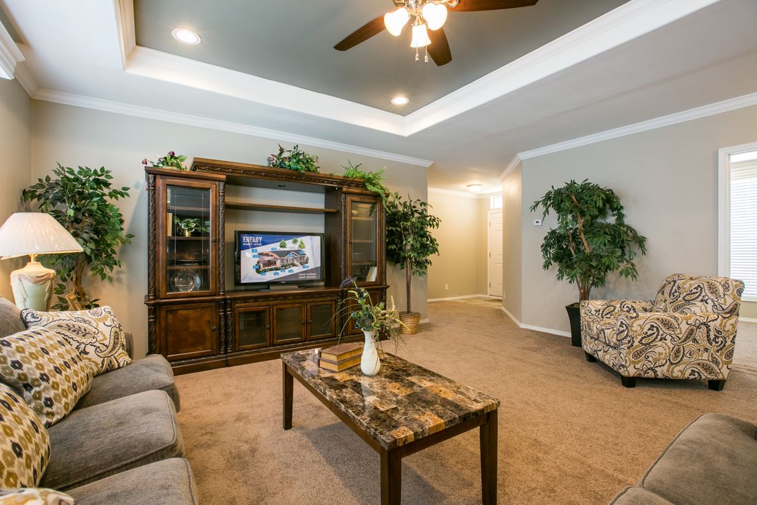 The TRANQUILITY TR3062A Living Room. This Manufactured Mobile Home features 3 bedrooms and 2 baths.