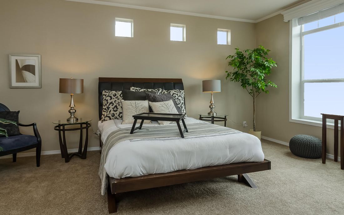 The TRANQUILITY TR3062A Primary Bedroom. This Manufactured Mobile Home features 3 bedrooms and 2 baths.
