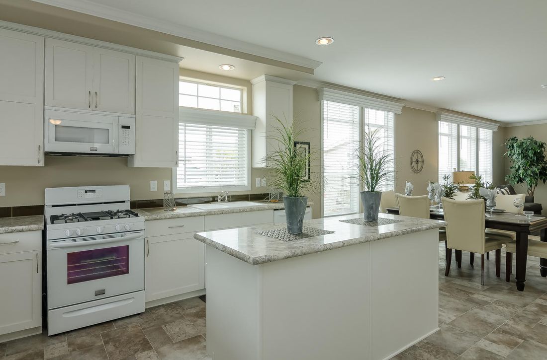 The TRANQUILITY TR3062A Kitchen. This Manufactured Mobile Home features 3 bedrooms and 2 baths.