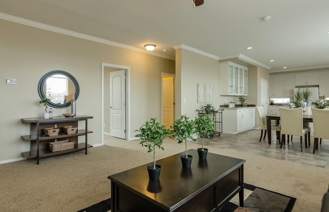 The TRANQUILITY TR3062A Living Room. This Manufactured Mobile Home features 3 bedrooms and 2 baths.