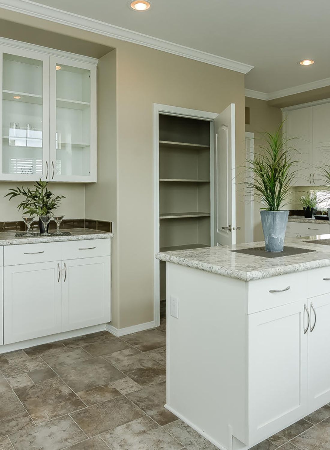 The TRANQUILITY TR3062A Kitchen. This Manufactured Mobile Home features 3 bedrooms and 2 baths.