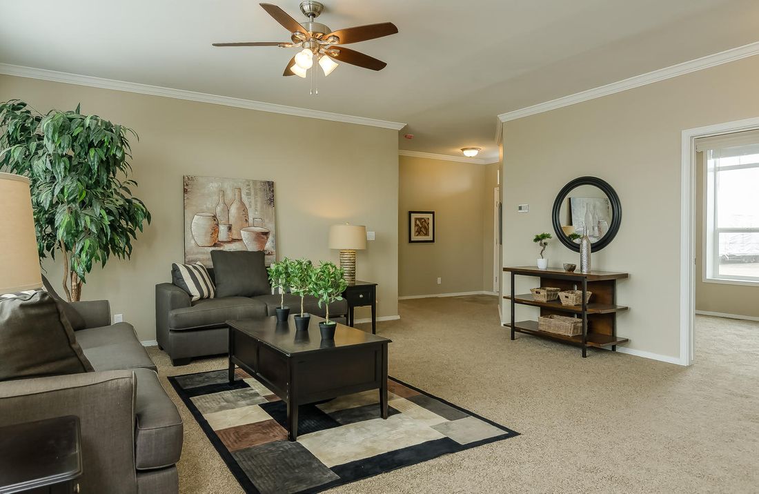 The TRANQUILITY TR3062A Living Room. This Manufactured Mobile Home features 3 bedrooms and 2 baths.