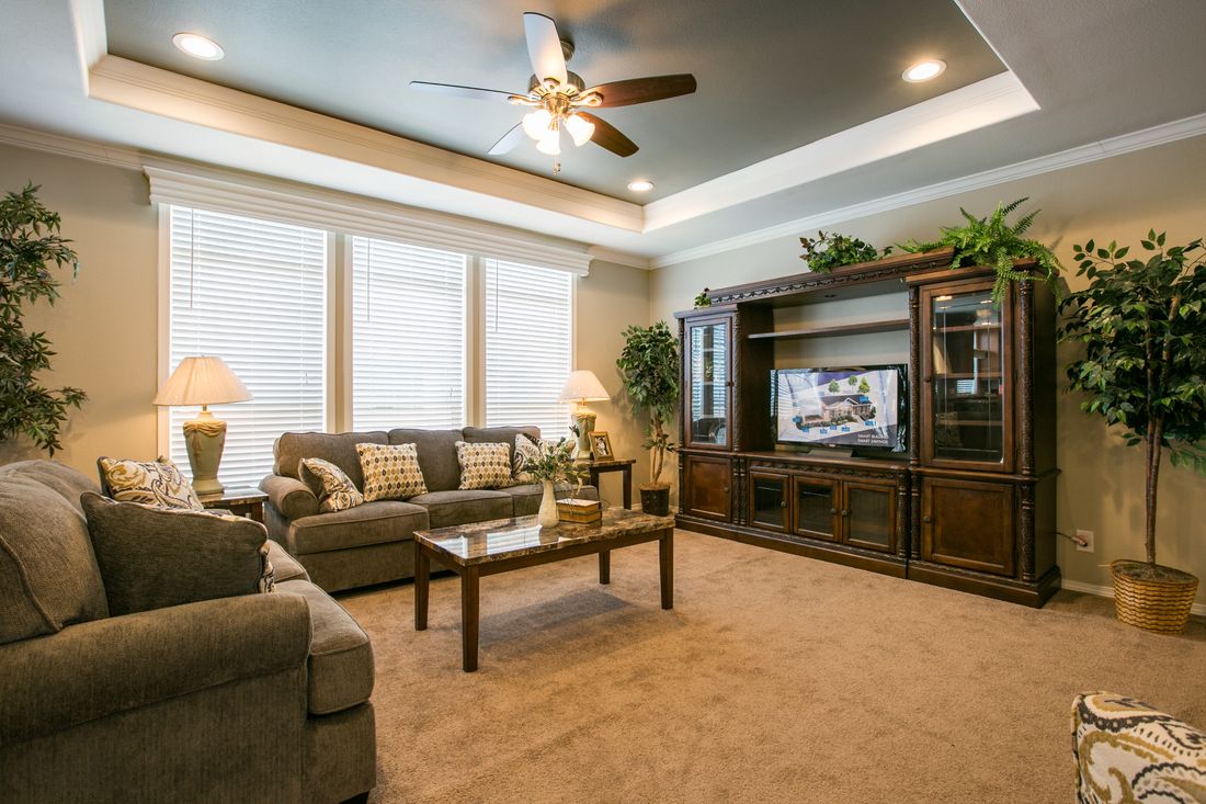 The TRANQUILITY TR3062A Living Room. This Manufactured Mobile Home features 3 bedrooms and 2 baths.