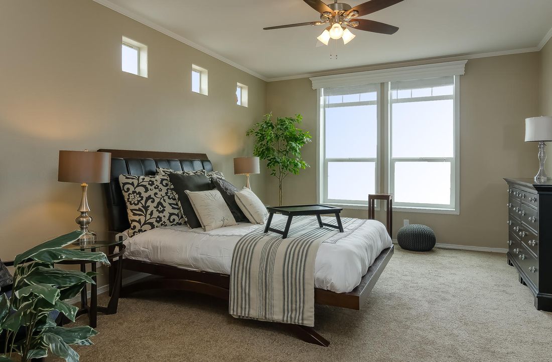 The TRANQUILITY TR3062A Primary Bedroom. This Manufactured Mobile Home features 3 bedrooms and 2 baths.