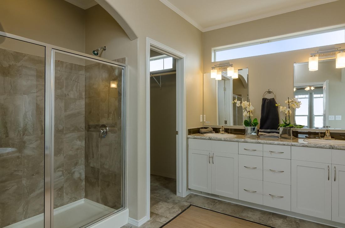 The TRANQUILITY TR3062A Primary Bathroom. This Manufactured Mobile Home features 3 bedrooms and 2 baths.