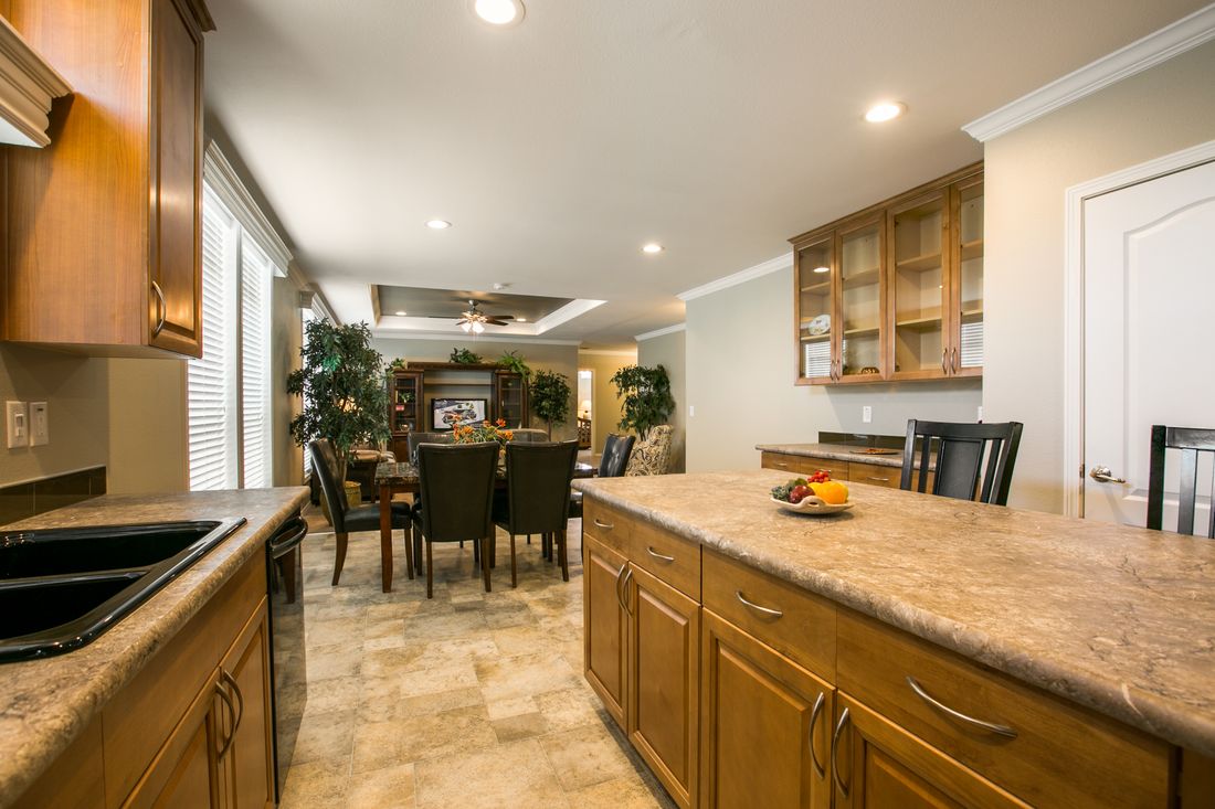 The TRANQUILITY TR3062A Kitchen. This Manufactured Mobile Home features 3 bedrooms and 2 baths.