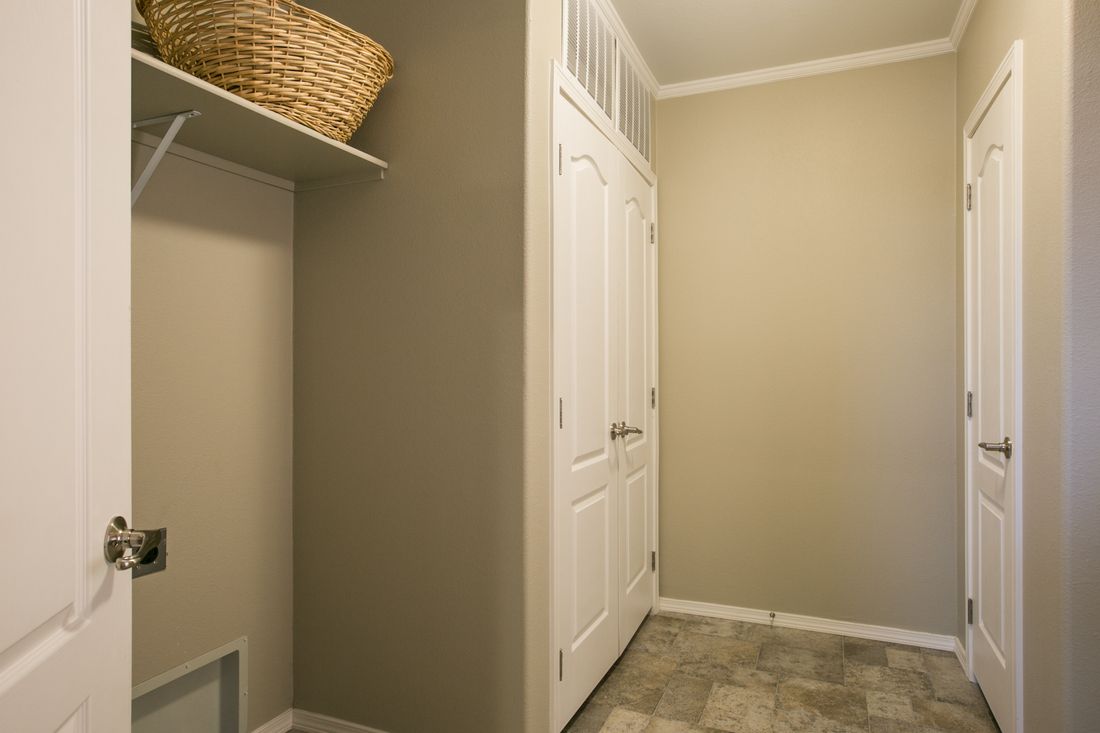 The TRANQUILITY TR3062A Kitchen. This Manufactured Mobile Home features 3 bedrooms and 2 baths.