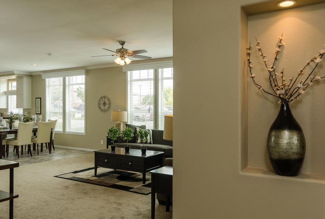The TRANQUILITY TR3062A Living Room. This Manufactured Mobile Home features 3 bedrooms and 2 baths.