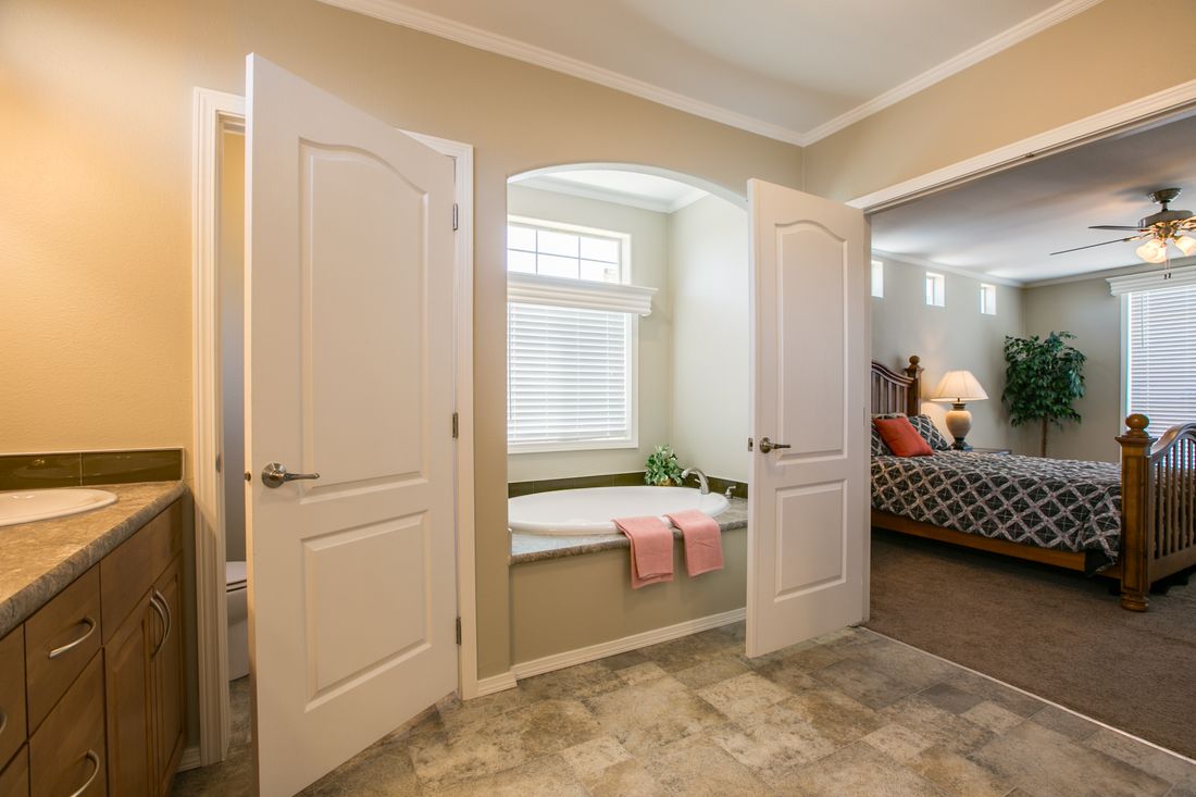 The TRANQUILITY TR3062A Primary Bathroom. This Manufactured Mobile Home features 3 bedrooms and 2 baths.