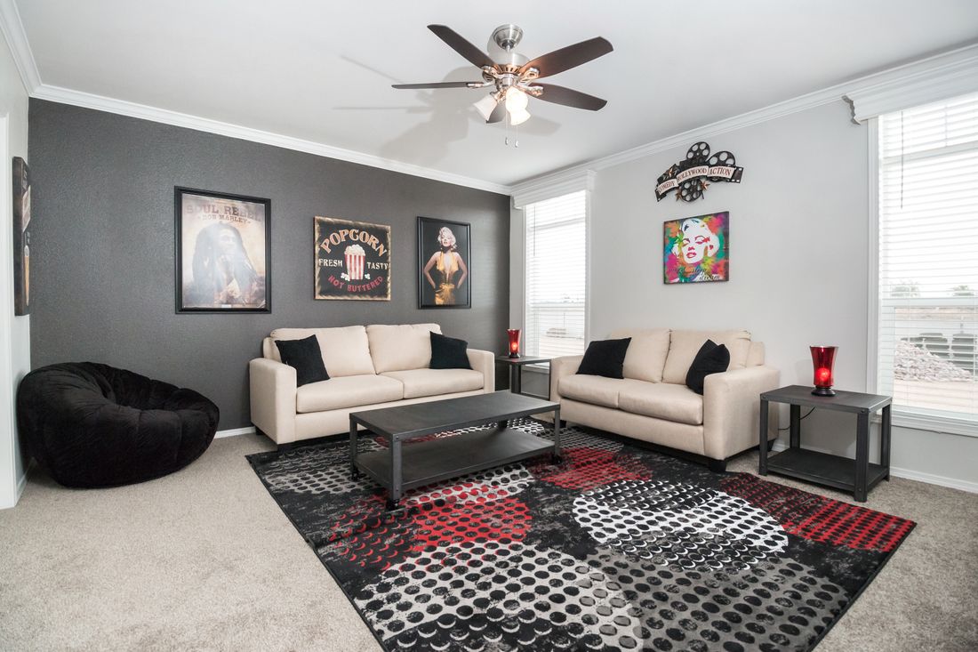 The ENCHANTMENT 3070A Den. This Manufactured Mobile Home features 3 bedrooms and 2 baths.