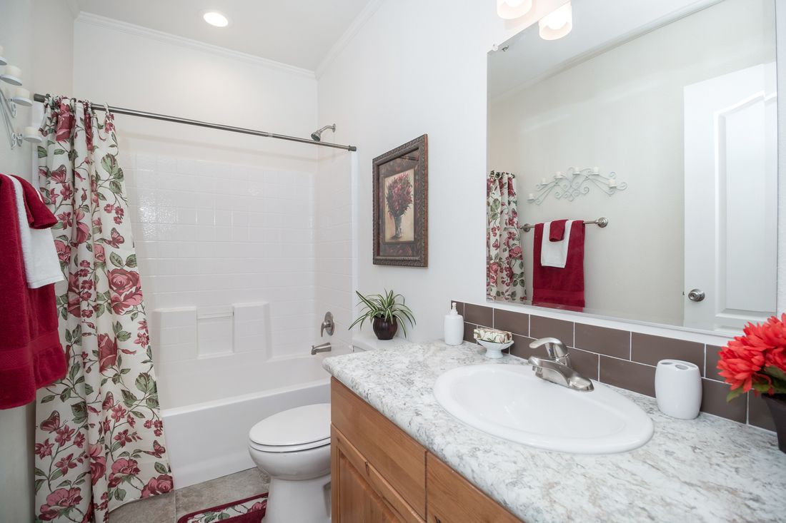 The K3068C Guest Bathroom. This Manufactured Mobile Home features 3 bedrooms and 2 baths.