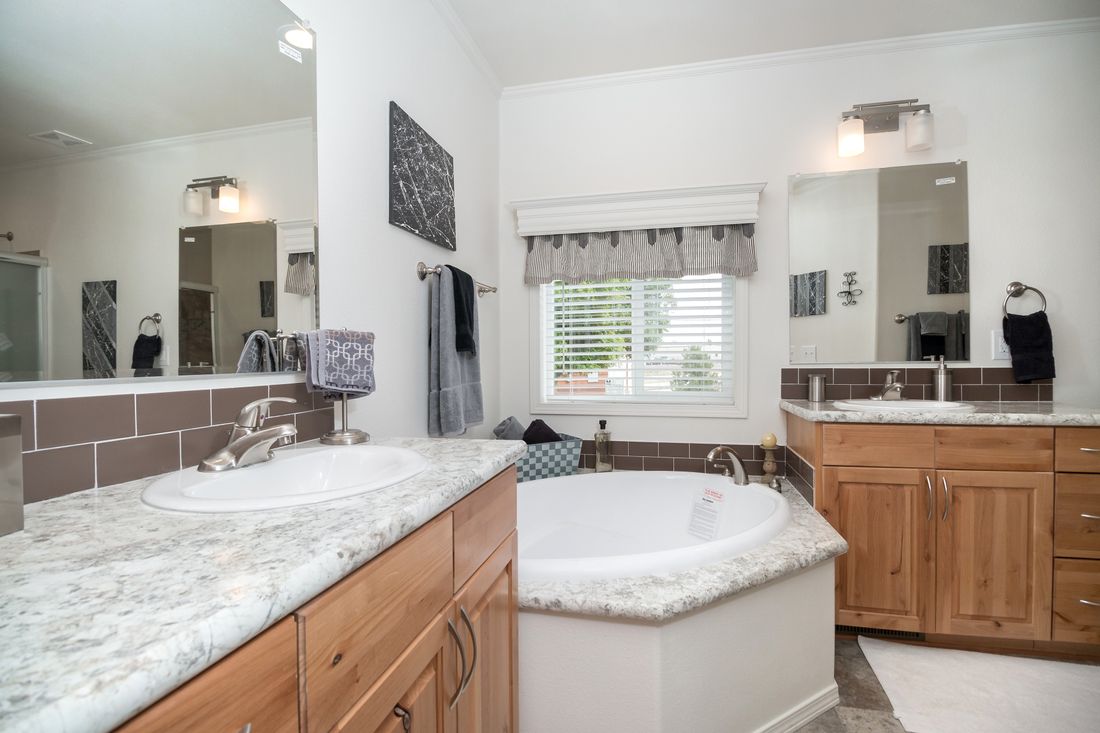 The K3068C Primary Bathroom. This Manufactured Mobile Home features 3 bedrooms and 2 baths.
