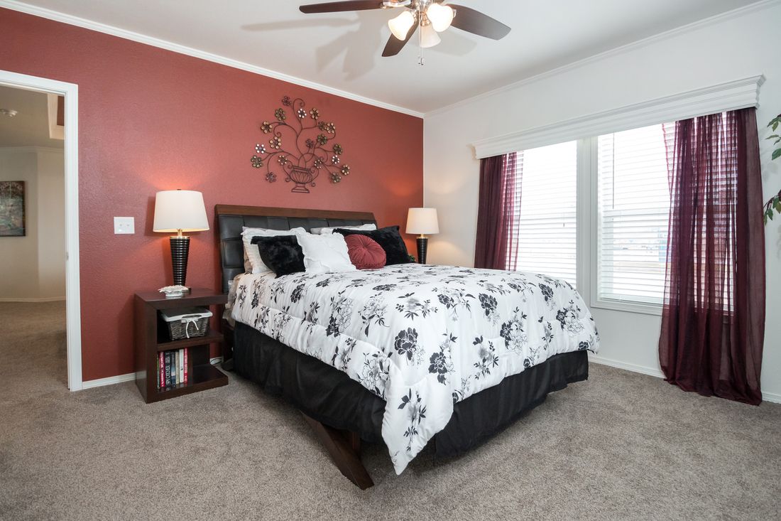 The K3068C Primary Bedroom. This Manufactured Mobile Home features 3 bedrooms and 2 baths.