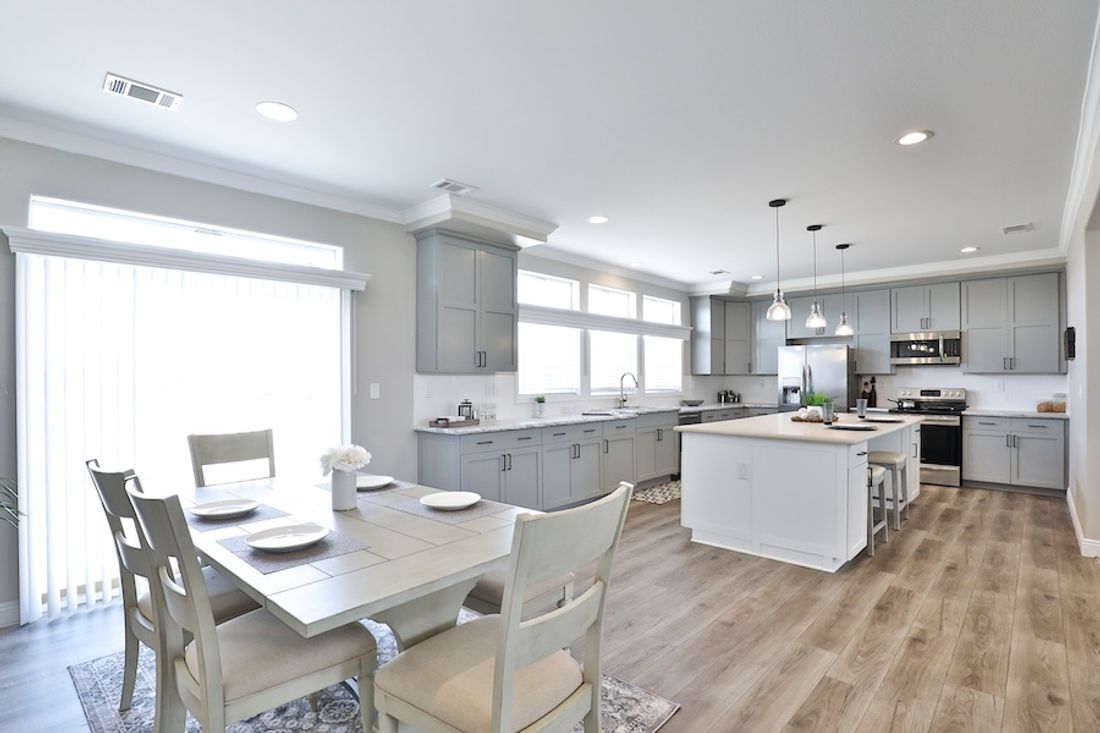 The EDGEWOOD Dining Room. This Manufactured Mobile Home features 3 bedrooms and 2 baths.
