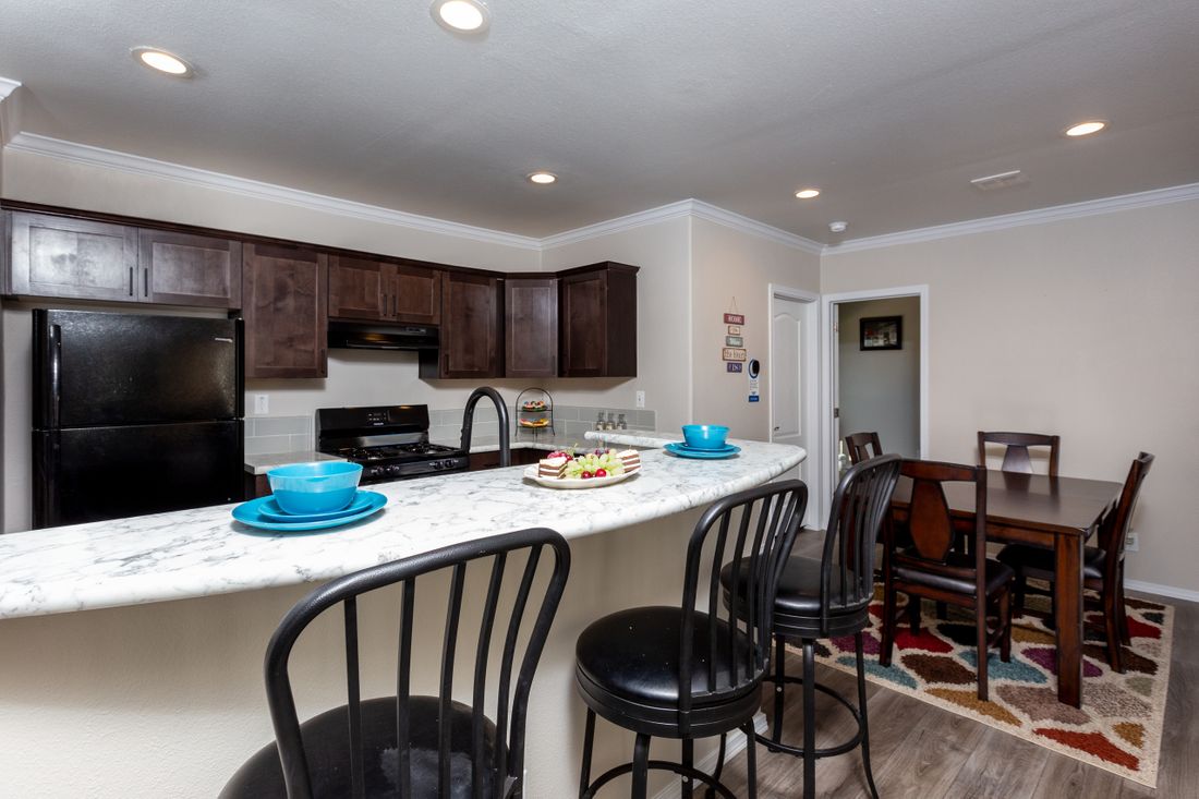 The K1668A Kitchen. This Manufactured Mobile Home features 2 bedrooms and 2 baths.