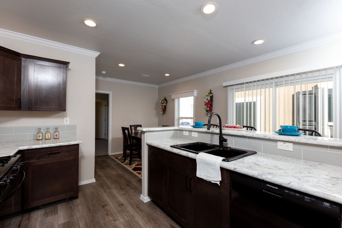 The K1668A Kitchen. This Manufactured Mobile Home features 2 bedrooms and 2 baths.